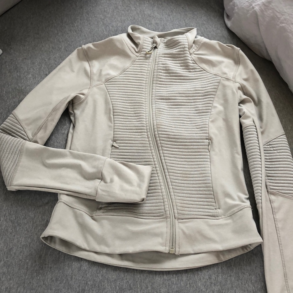 Beige athletic zip up jacket